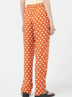 Store COMPANIA FANTASTICA Trousers - Orange Polka Dots